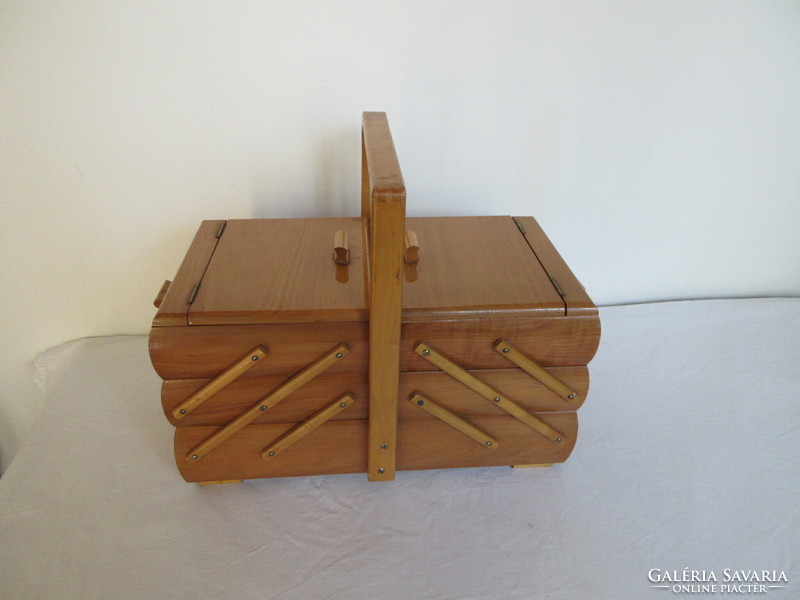 Old, solid wood, 3-story, art deco sewing chest.. Negotiable!.