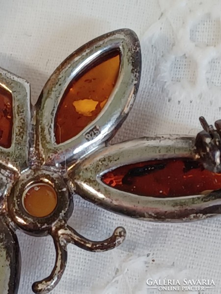 Vintage amber butterfly in silver socket