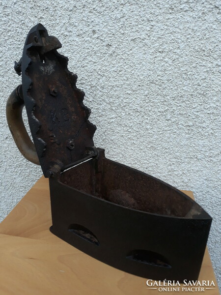Antique cast iron iron with rooster