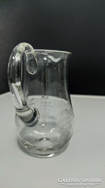 Small old wine pouring jug
