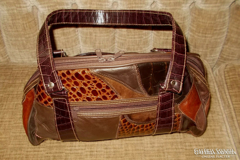 Retro bag made of leather pieces.