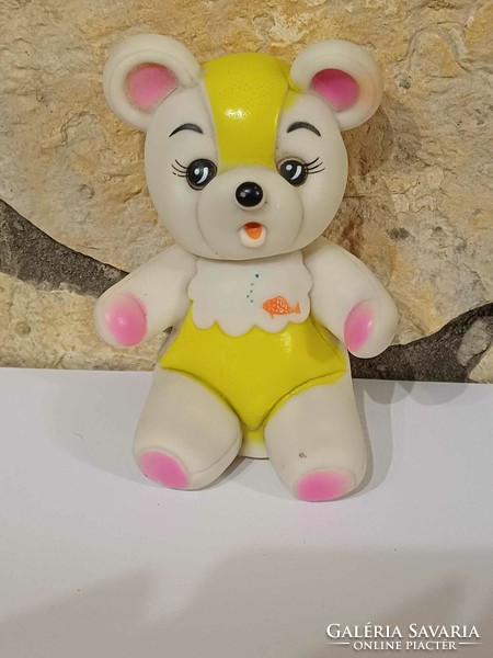 Fairy old rubber teddy bear with whistle