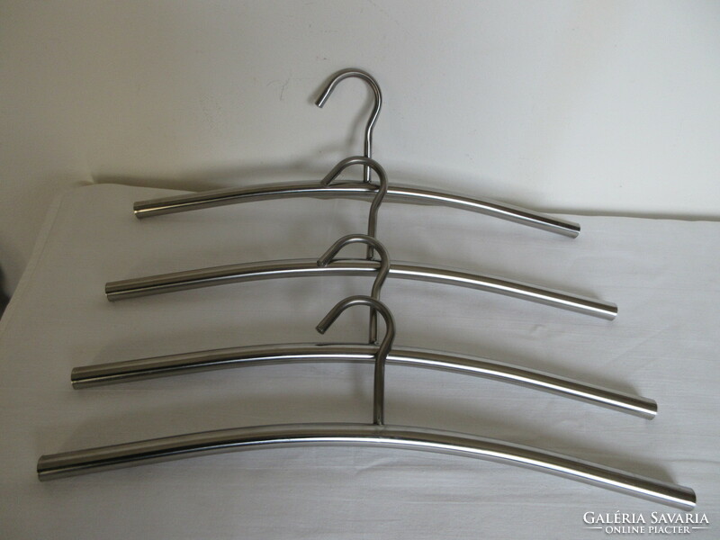 Old, art deco metal hangers. Negotiable!