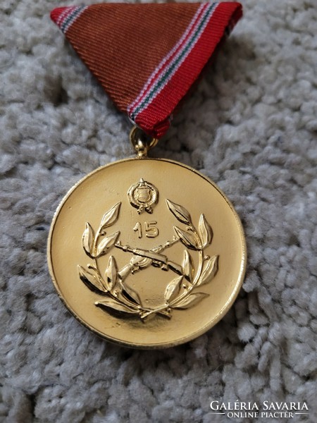National Defense Merit Medal for 15 years.