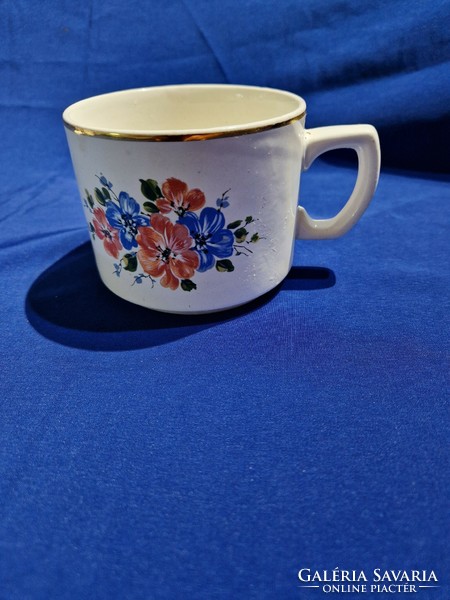 Granite tea cup mug with floral pattern