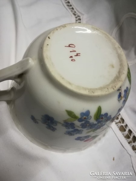 Old, rosy, thicker-walled porcelain tea cup