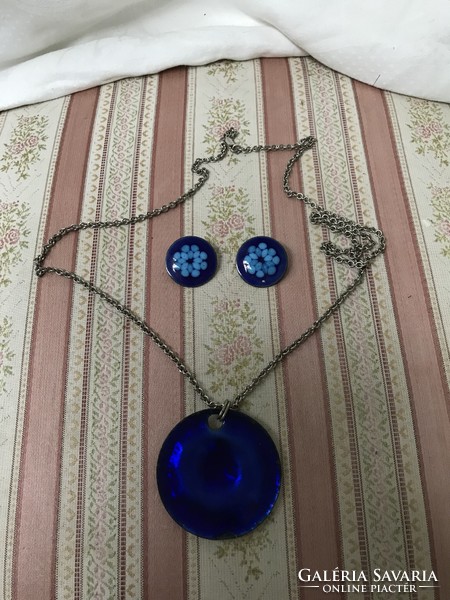 Crafted by a craftsman, a royal blue fire enamel pendant with a matching fire enamel clip