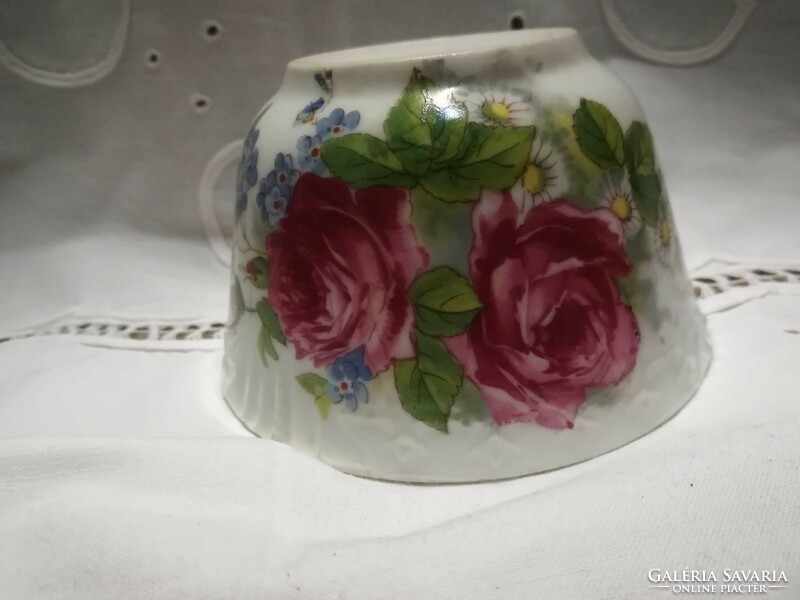 Old, rosy, thicker-walled porcelain tea cup