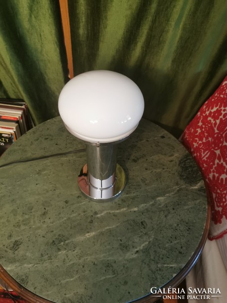 Art deco style chrome table lamp with a milky white shade