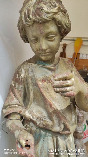 Fountain v. Decorative cast iron statue from the 19th century