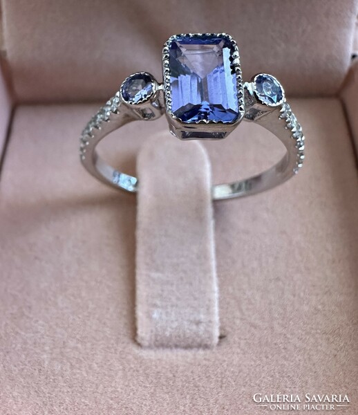 Solid white gold ring with blue tanzanite and diamonds