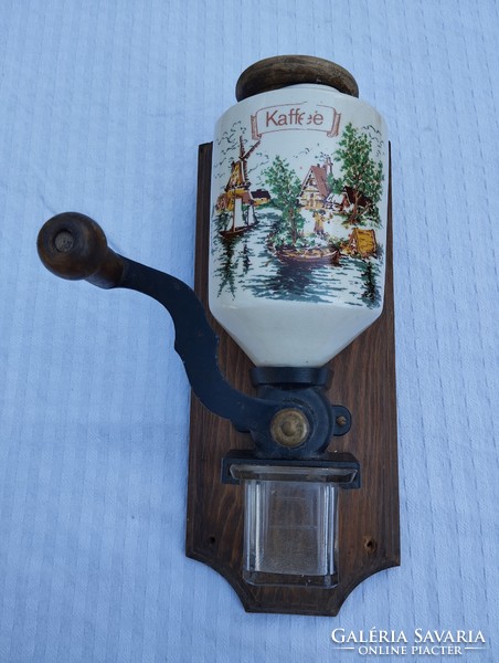 Nice wall-mounted coffee grinder in working condition