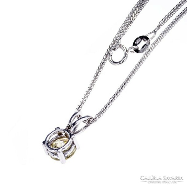 White gold chain with a giant diamond pendant