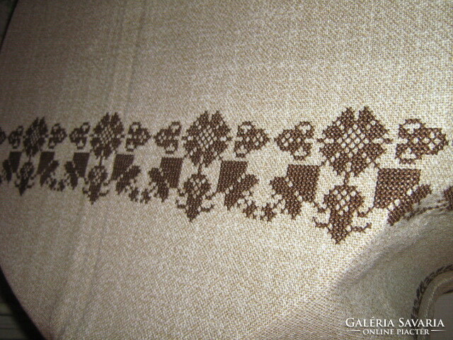 Beautiful antique hand embroidered cross-stitched tablecloth