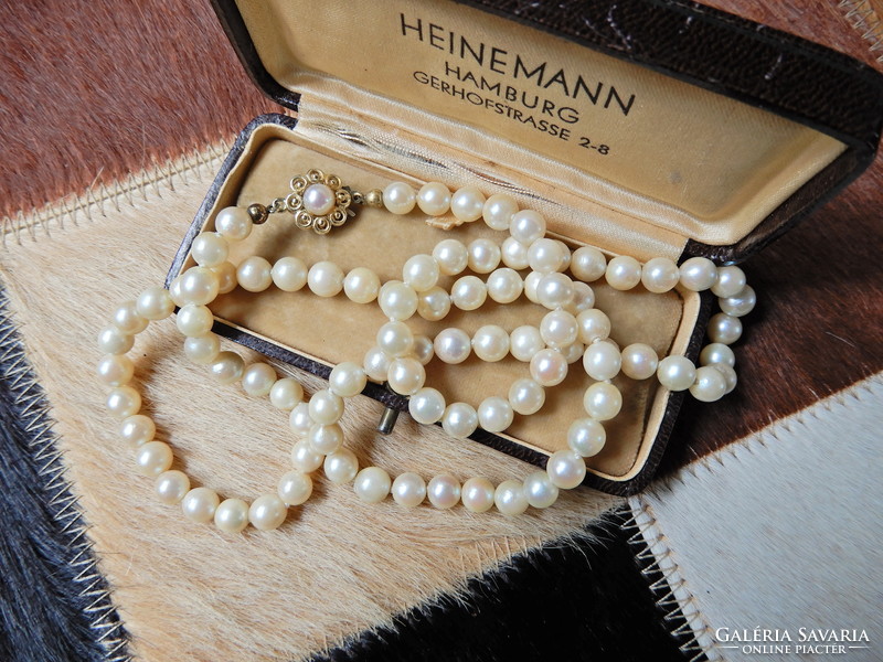 Real pearls with 14 carat filigree gold clasp
