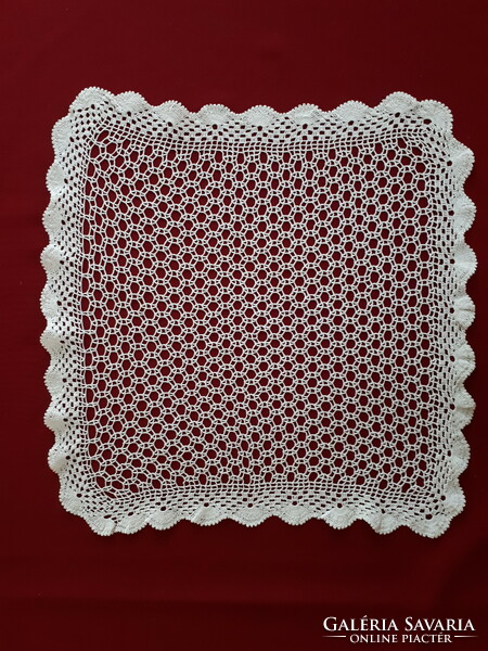 Square crochet tablecloth with a geometric pattern