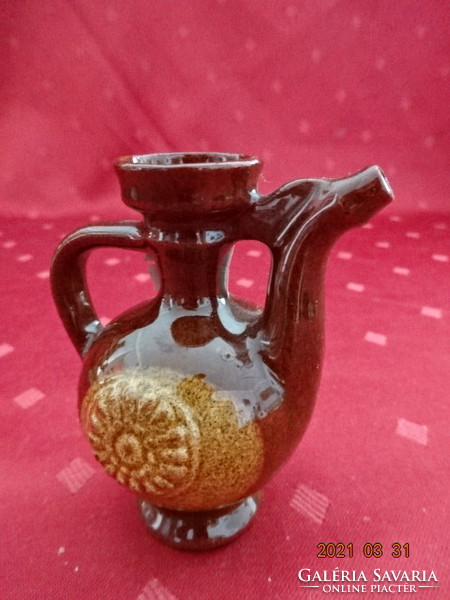 Glazed ceramic jug, height 8 cm. He has!