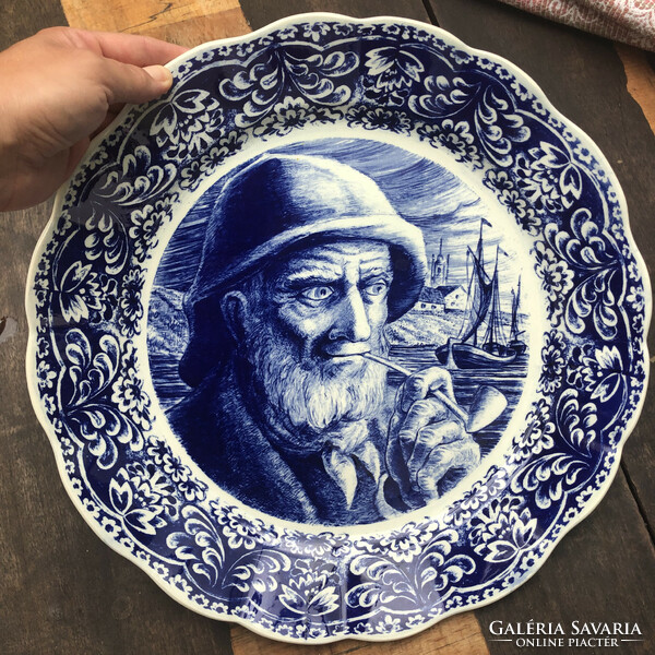Delft porcelain wall plate with a sailor motif