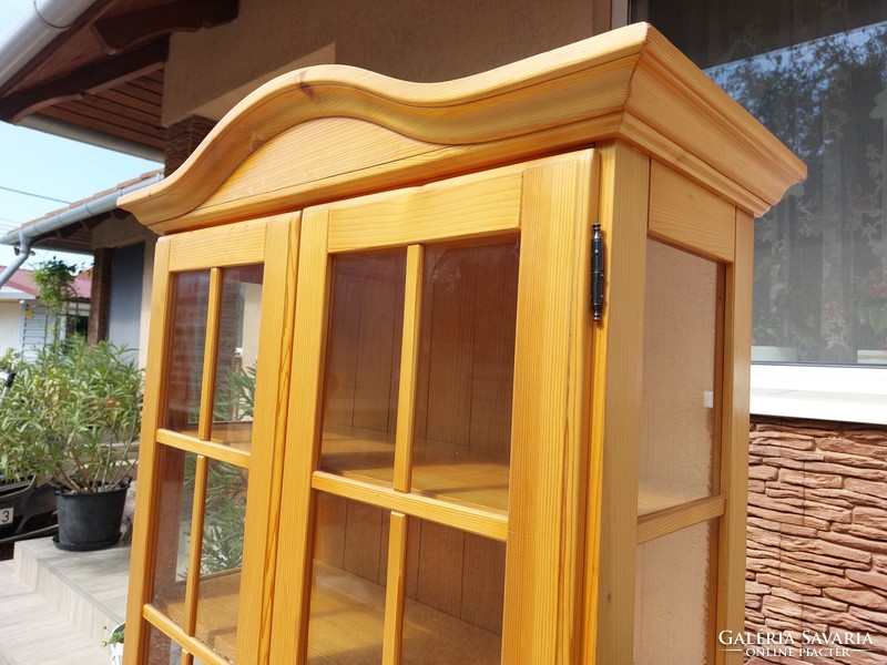 For sale is a Sziged display cabinet furniture in good condition.