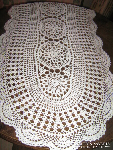 Beautiful white hand-crocheted filigree tablecloth with Art Nouveau features