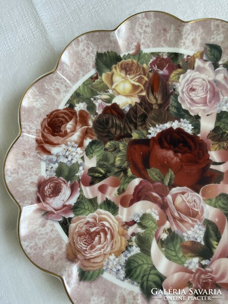 A dreamy English porcelain numbered decorative plate that can also be hung on the wall
