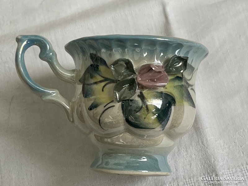 Dreamy antique earthenware teacup decorated with hand-painted plastic flowers