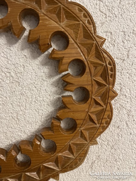 Larger carved wooden oval picture frame.