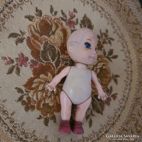 Small old toy doll