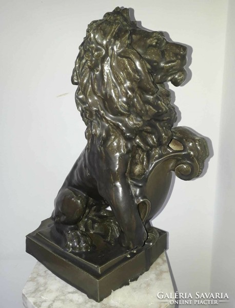 80 Cm. Wooden statue, pyrogranite lion.
