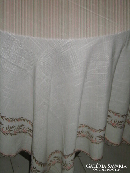 Beautiful pastel floral patterned tablecloth with a lace edge