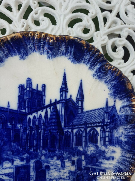 Blue scene wall plate painted under antique English glaze
