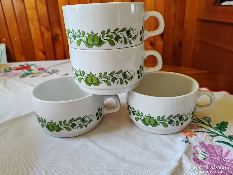 Lowland tea cup with a green folk motif