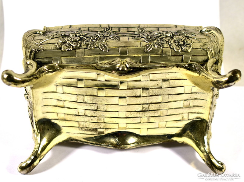 A dreamy larger silver-plated jewelry box with a rich relief pattern