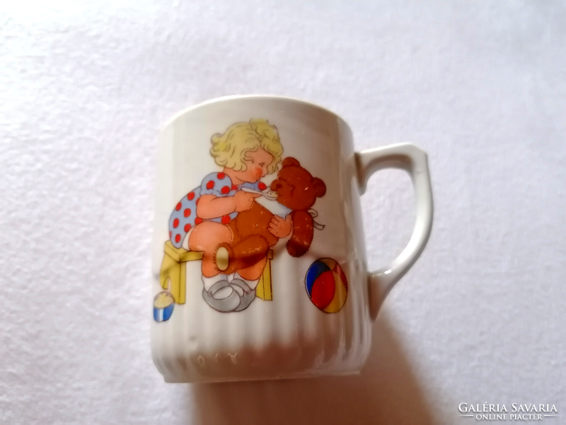 A very rare Zsolnay mug from Cluj, a little girl with a teddy bear and a ball