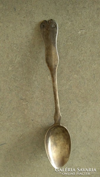 Silver slide-marked teaspoon