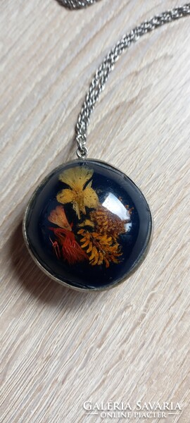 Old Polish pendant with pressed flowers