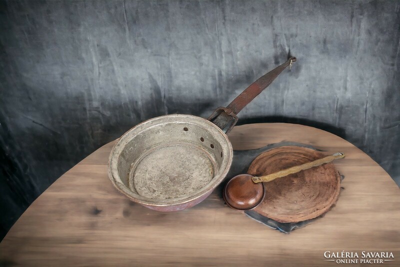 Antique copper pan and copper ladle