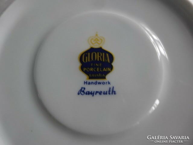 Quality German porcelain tea cup coaster, hand painted, diameter 16 cm. He has.