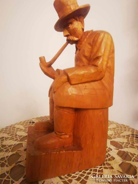Piper Székely carved wooden statue