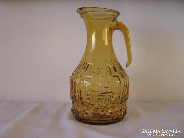 Honey colored glass pitcher
