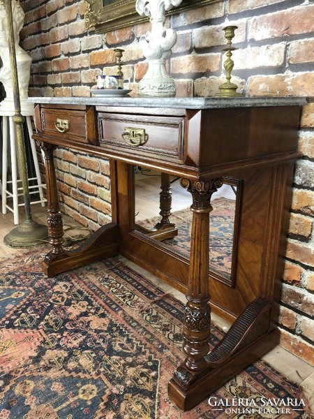 Refurbished console table with marble top.