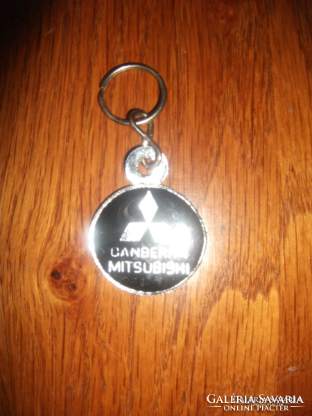 For collectors! Mitsubishi old metal key ring from the capital of Australia unused