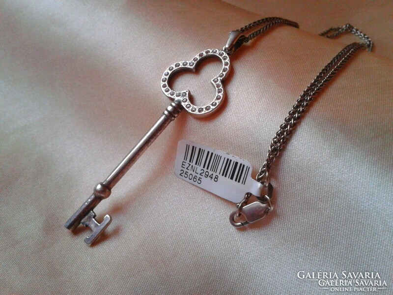 Silver necklace with key pendant, zirconia stones.