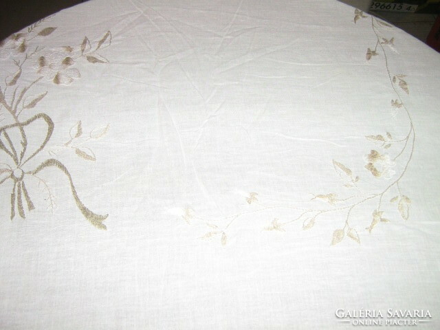 Wonderful machine embroidered pastel colored filigree light tablecloth
