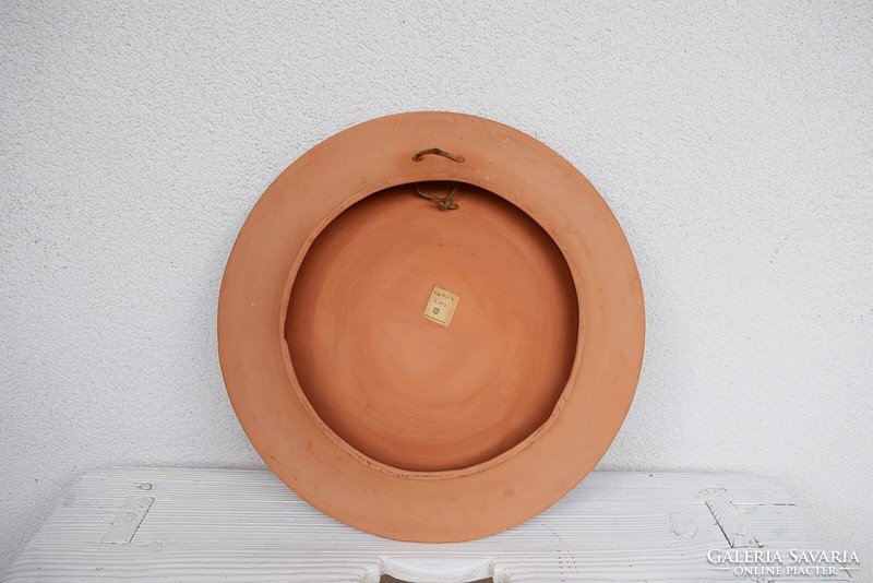 A beautiful large wall plate gift with a small bowl