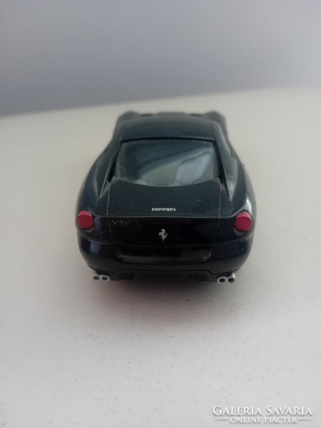 3 small Ferrari cars