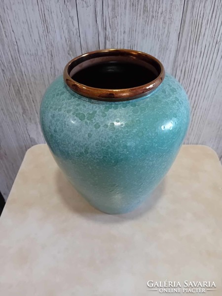 Ceramic vase with copper rim