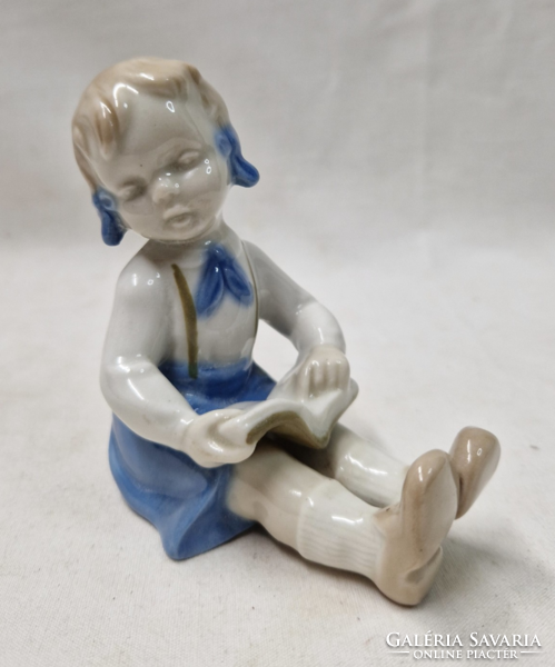 Old German porcelain reading girl figurine in perfect condition 10 cm.