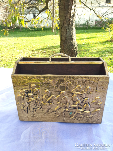 Handcrafted brass magazine holder with relief pattern,