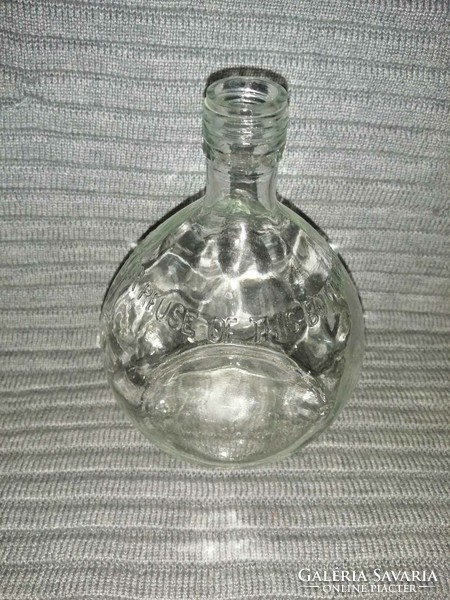 Glass bottle with the inscription Federal law forbids sale or reuse of this bottle (a1)